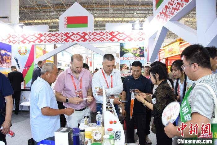 中国食品名城漯河食品博览会 国际展区特色食品 外商看好中国市场_食博会的网站